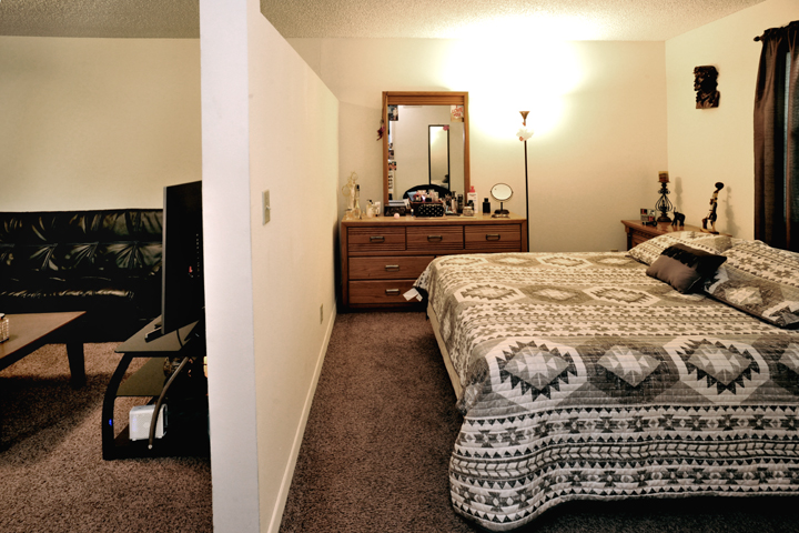 Bedroom with bed and lamps